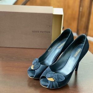 Louis Vuitton suede pumps.